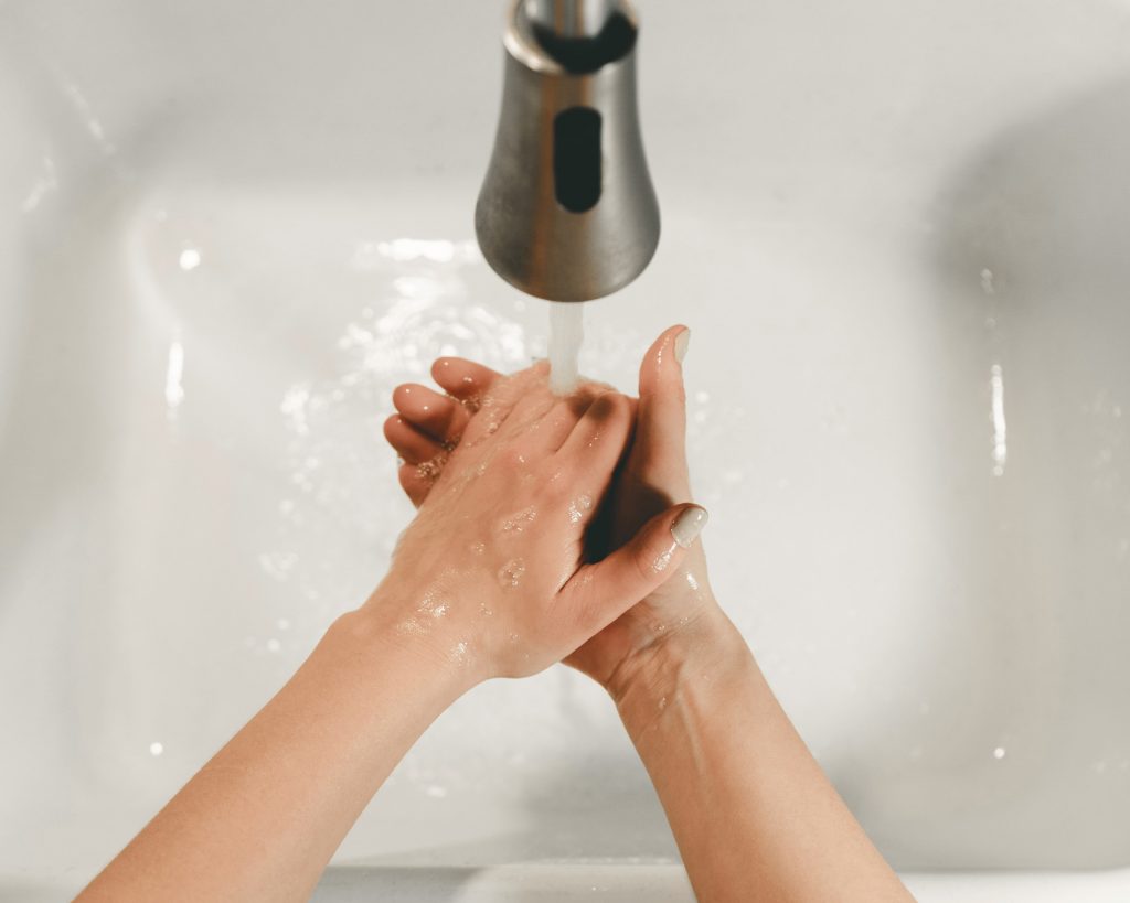person washing hands